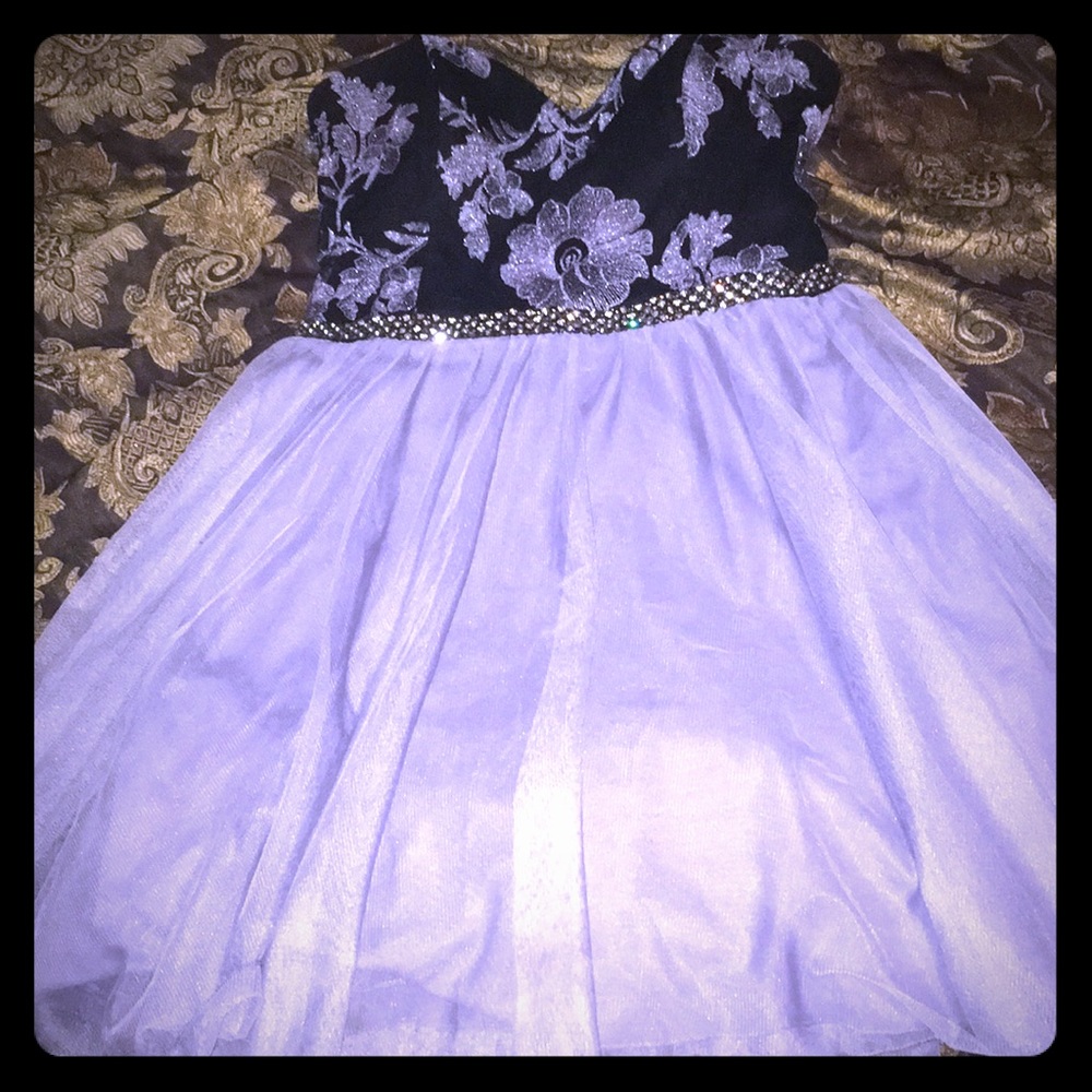 Need a homecoming or prom dress for your daughter